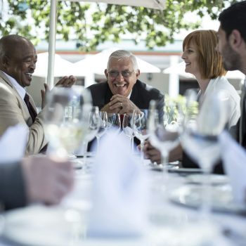 Business people having business lunch in restaurant