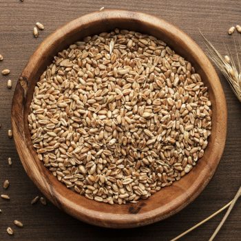 Wheat On Wooden Background